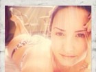 Demi Lovato posta foto de biquíni durante viagem ao Brasil