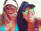 Aline Riscado curte praia com amiga: 'Para relaxar'
