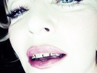 Madonna diz a revista que já deu amassos com 'grills': 'Funciona'