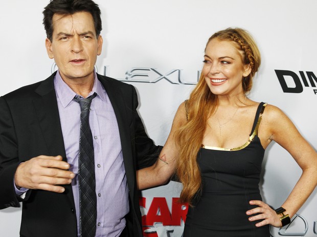 Charlie Sheen e Lindsay Lohan em première de filme em Los Angeles, nos Estados Unidos (Foto: Fred Prouser/ Reuters)