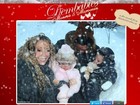 Mariah Carey rola na neve com os filhos para desejar Feliz Natal a fãs