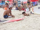 Veja a grávida Juliana Paes se divertindo com a família na praia