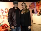 Luciano Szafir vai com a mulher grávida de 9 meses ao Fashion Rio