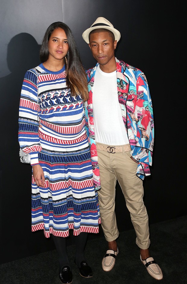 Pharrell Williams e Helen Lasichanh em evento em Los Angeles, nos Estados Unidos (Foto: Frederick M. Brown/ Getty Images/ AFP)