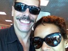 Tais Araújo posta foto com Luiz Henrique Nogueira no aeroporto