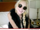 Lindsay Lohan posta foto para mostrar sorriso em ordem