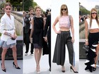 Jennifer Lawrence deixa barriguinha de fora em look para desfile, em Paris