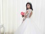 Jennifer Pamplona, a Susi Humana, posa vestida de noiva