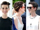 Anne Hathaway aposta em penteados com acessórios diferentes