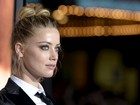Amber Heard se divorcia de Johnny Depp e doa US$ 7 milhões 
