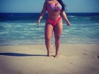 Mulher Melancia mostra curvas em tarde na praia