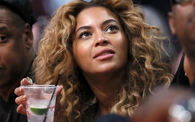 Beyoncé com o marido Jay-Z no NBA All-Star Game (Foto: Reuters)