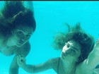 Grazi Massafera exibe corpo em forma em mergulho com amiga