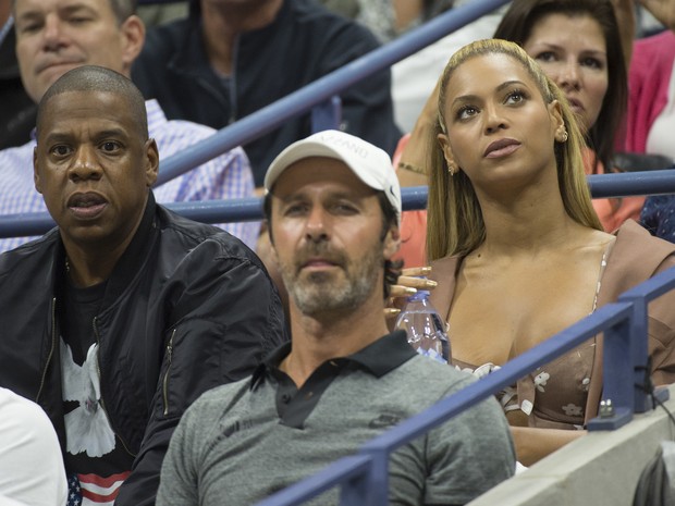 Jay-Z e Beyoncé assistem à partida de tênis no US Open em Nova York, nos Estados Unidos (Foto: Don Emmert/ AFP)