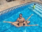 Kamilla Salgado e Eliéser exibem corpos sarados na piscina