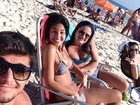 Inverno? Bruno Gissoni curte praia no Rio com namorada e posta foto