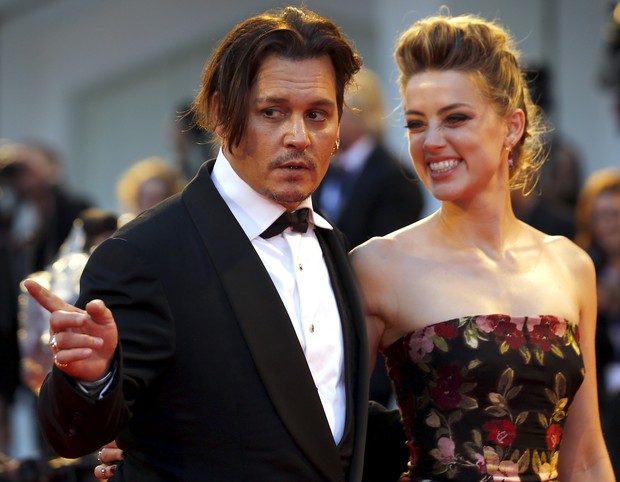 Amber Heard e Johnny Depp (Foto: AFP)