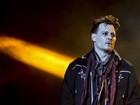 Johnny Depp, acusado por Amber Heard de agressão, faz show