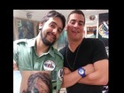 Thiago Martins e lutador de MMA Gleison Tibau fazem novas tatuagens