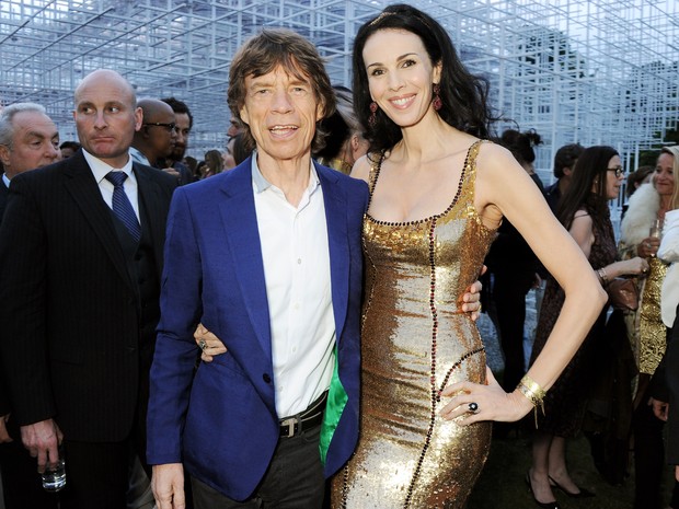 Mick Jagger e L&#39;Wren Scott em evento em Londres, na Inglaterra (Foto: Dave M. Benett/ Getty Images)