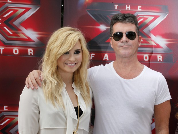 Demi Lovato e Simon Cowell em evento para promover a nova temporada do &#39;The X Factor&#39; em Los Angeles, nos EUA (Foto: Fred Prouser/ Reuters)
