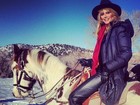 Heidi Klum se diverte andando a cavalo