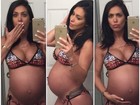 Bella Falconi faz piada com barrigão de grávida e seios imensos