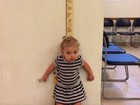 Fernando Scherer brinca com altura da filha: 'Quase do tamanho da girafa