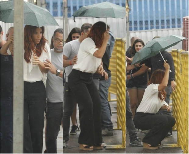 Ivete Sangalo enfrenta chuva na chegada à Apoteose, no Rio, antes de show (Foto: Marcello Sá Barretto e Daniel Pinheiro / AgNews)