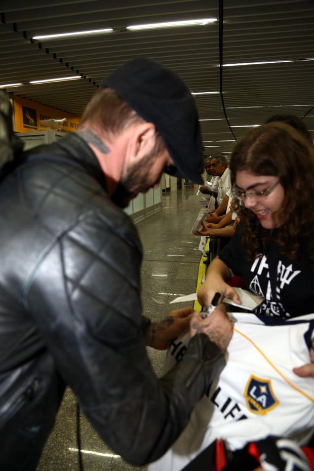 David Beckham chega ao Rio para desfile das campeãs (Foto: Gabriel Reis / Ag. News)