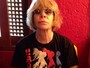Rita Lee faz homenagem e veste camiseta com foto de David Bowie