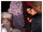 Filha de Kim Kardashian faz cara feia para Papai Noel