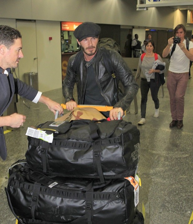 David Beckham chega ao Rio para desfile das campeãs (Foto: Gabriel Reis / Ag. News)