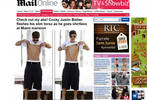 Justin Bieber mostra abdômen ao perceber que estava sendo clicado por fotógrafos (Foto: Daily Mail/Reprodução)