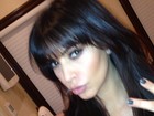 Kim Kardashian muda de visual e mostra franja em rede social