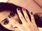 Fã do esmalte branco, Anitta mostra as unhas coloridas: 'Momento inédito'