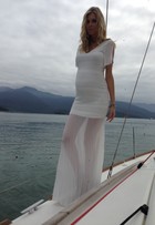 Kelly Gisch, namorada de Cesar Cielo, exibe barriguinha de grávida