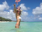Heidi Klum celebra independência dos Estados Unidos com foto na praia